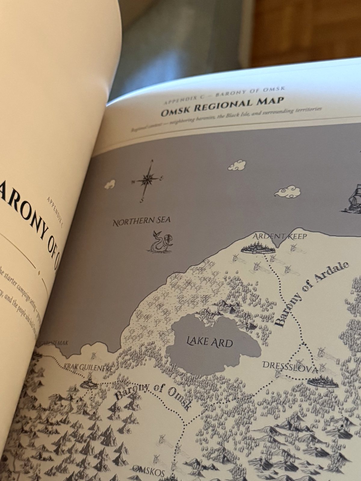 The book open to the Omsk regional map in Appendix C.